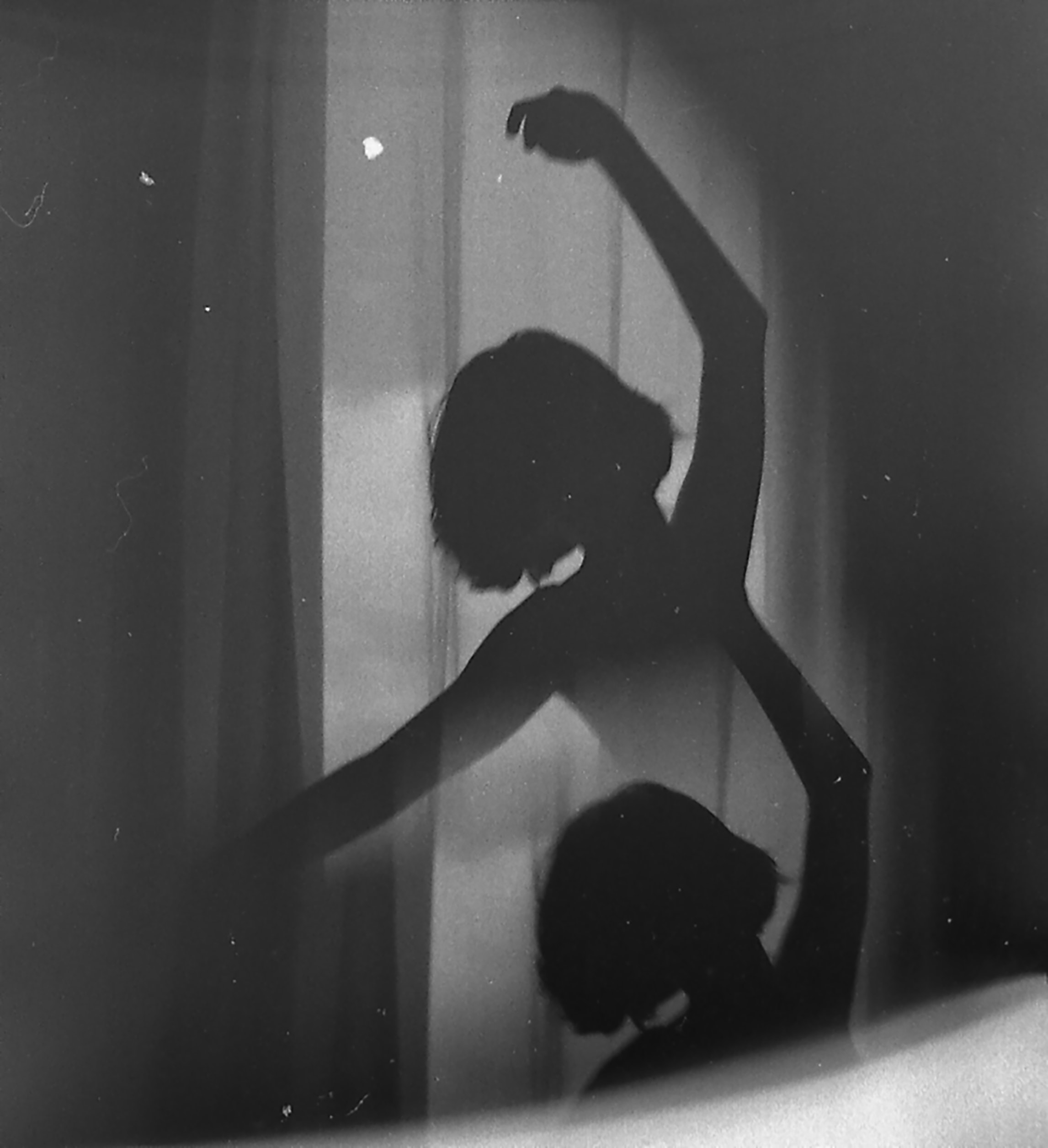 Girl dancing. Black and white photo representing how to start Shadow Work Questions